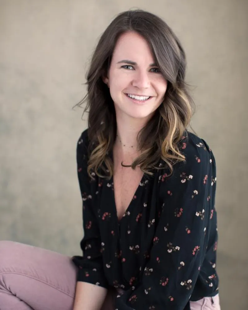 a woman sitting on a couch