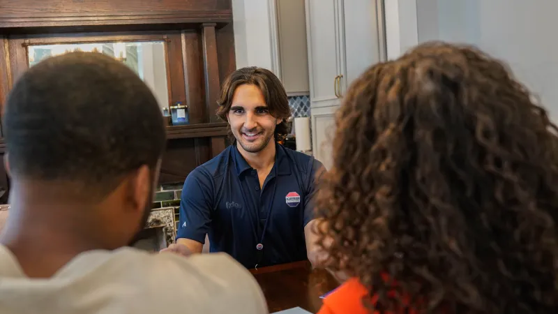 a person talking to a group of people