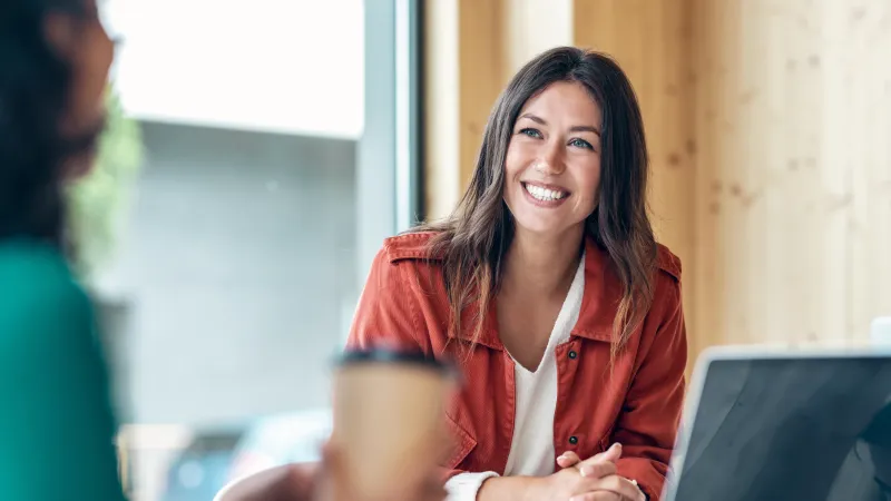 a woman smiling at something
