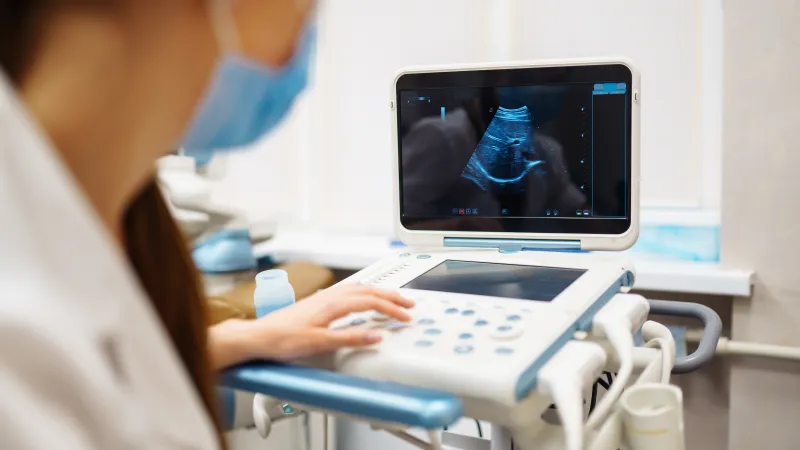 a doctor using a computer