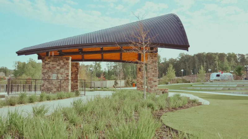 a building with a grass field