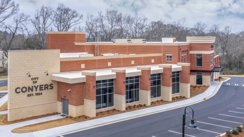 a building with a road in front