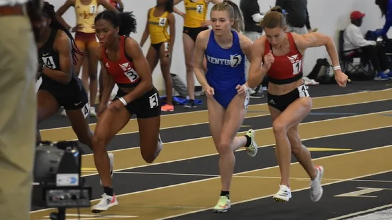 a group of runners on a track