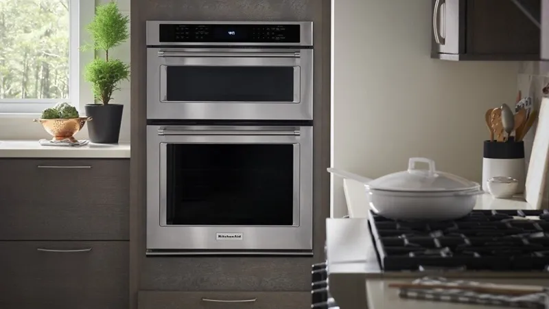 a kitchen with white cabinets