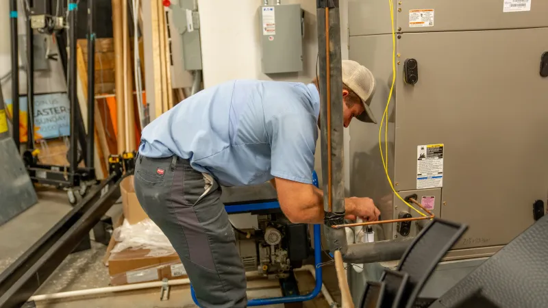 a person working on a machine