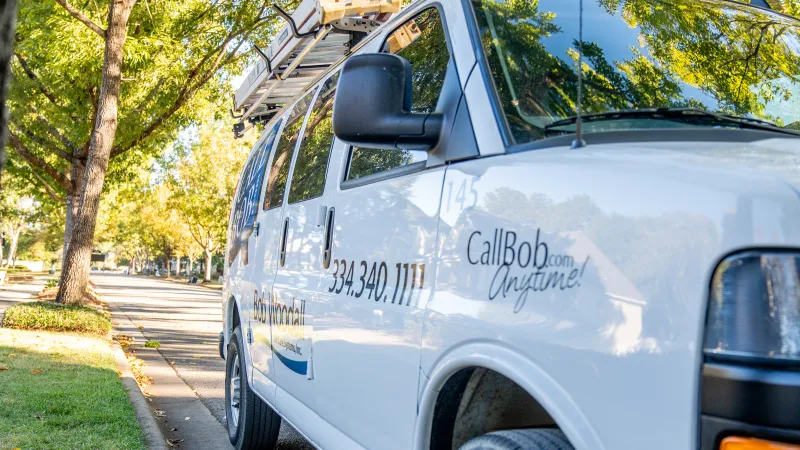 a white van parked on the side of a road