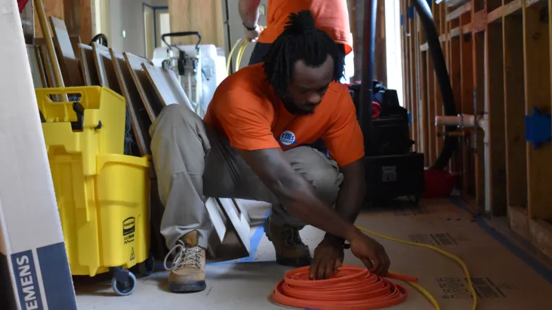 Rewiring process. Estes Electricians working in Duluth on a Rewiring home