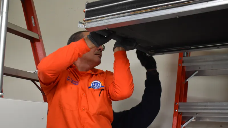 Estes Commercial Team repairing a Coil