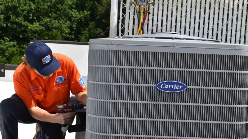Estes Services Technician in Canton, Georgia fixing an HVAC System