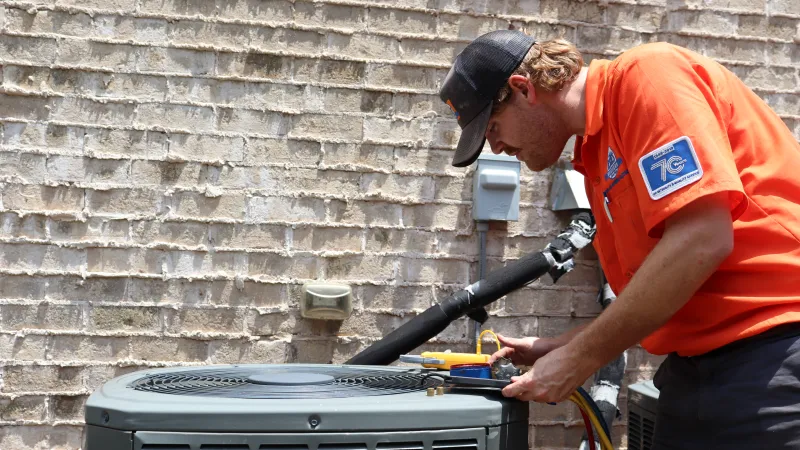 Coston, Estes  HVAC Tech performing an HVAC Maintenance in Duluth, Georgia
