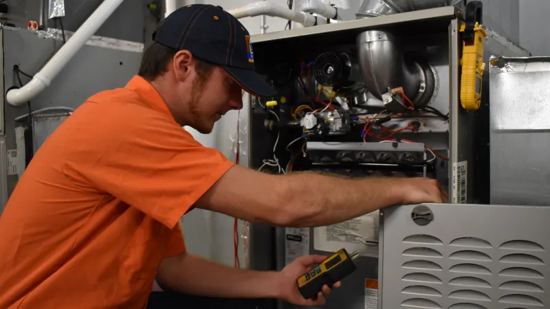 Chris, Estes HVAC Technicians is tuning up an HVAC equipment in Morrow, Georgia