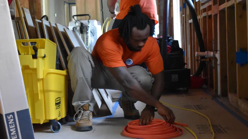Rewiring process. Estes Electricians working in Duluth on a Rewiring home