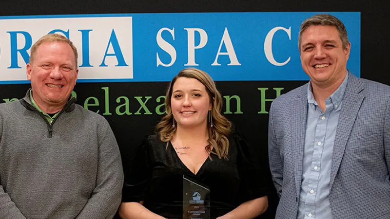 Doman-Eisner accepting the Customer Care Award