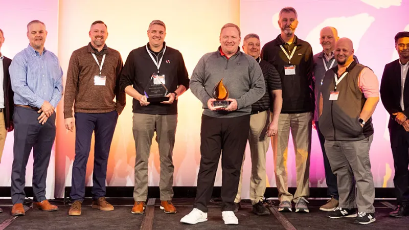 Georgia Spa Company accepts the North American Dealer of the Year Award from Caldera Spas