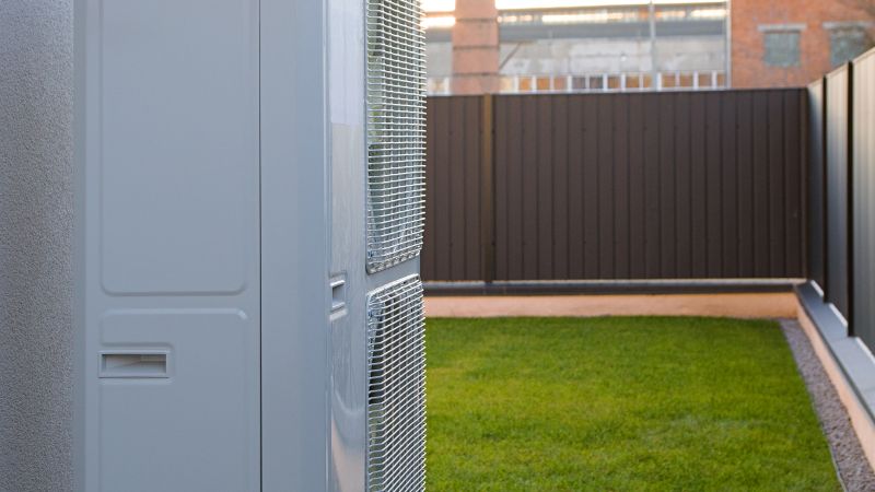 a woman talking on a phone next to a man in a hospital bed