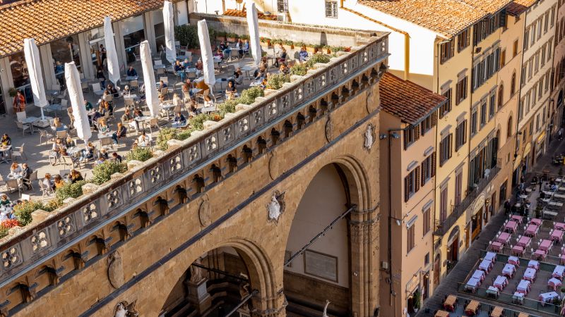 a large courtyard with buildings around it