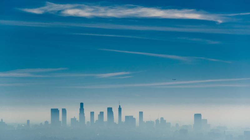 a city skyline with clouds