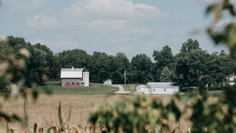 a farm with a few buildings