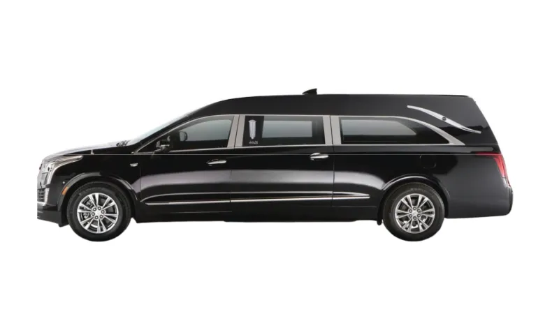 Side view of a sleek black luxury hearse, showcasing elegant design and modern features.
