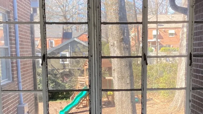 A room with an old window that does not look nice