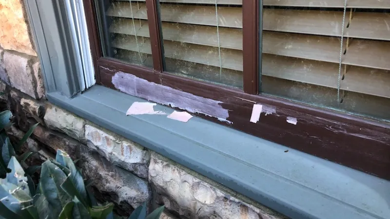 a window with chipping paint - a common window problem
