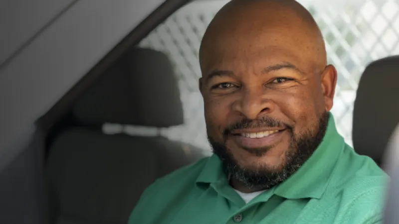 a man smiling for the camera