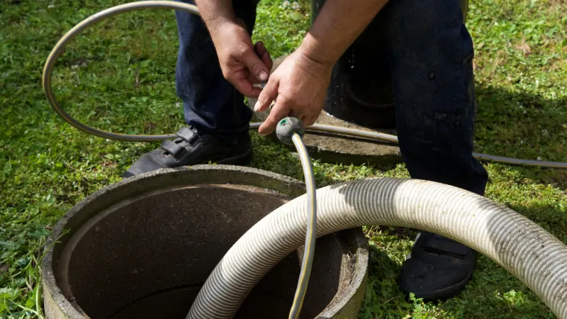 a person holding a tire