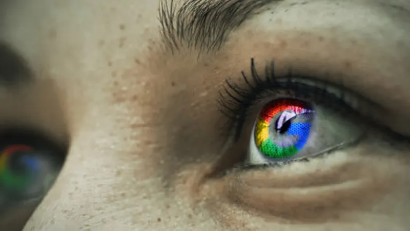 Close-up of eyes with reflected colorful digital patterns symbolizing technology and innovation.