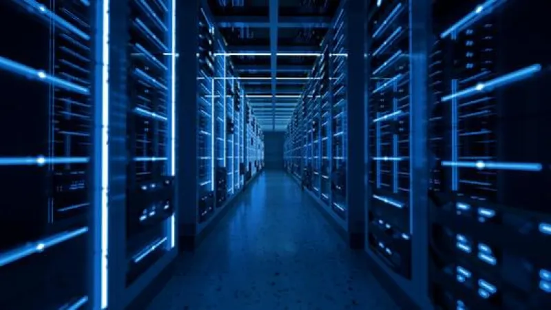 a long hallway with rows of computer servers