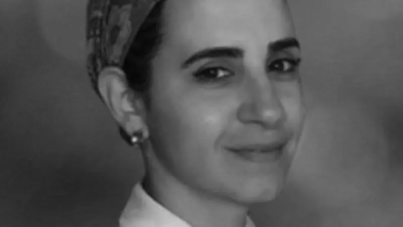 a person with a scarf on the head