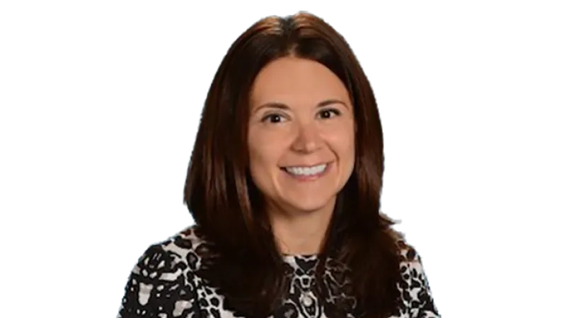 a woman smiling at the camera