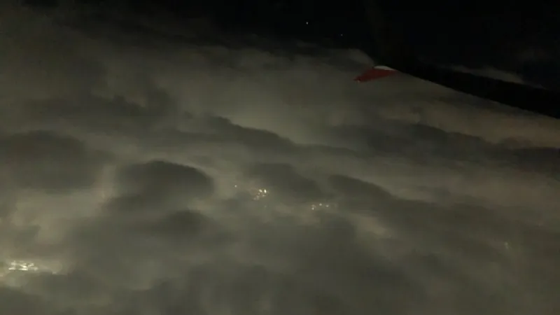 an airplane wing in the sky