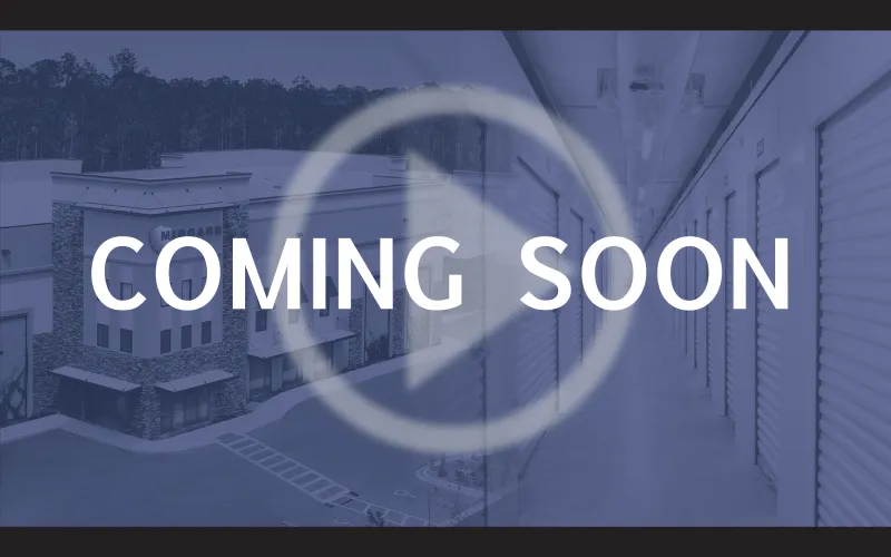 a sign in front of a building