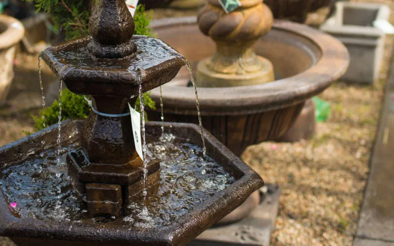 a statue in a garden