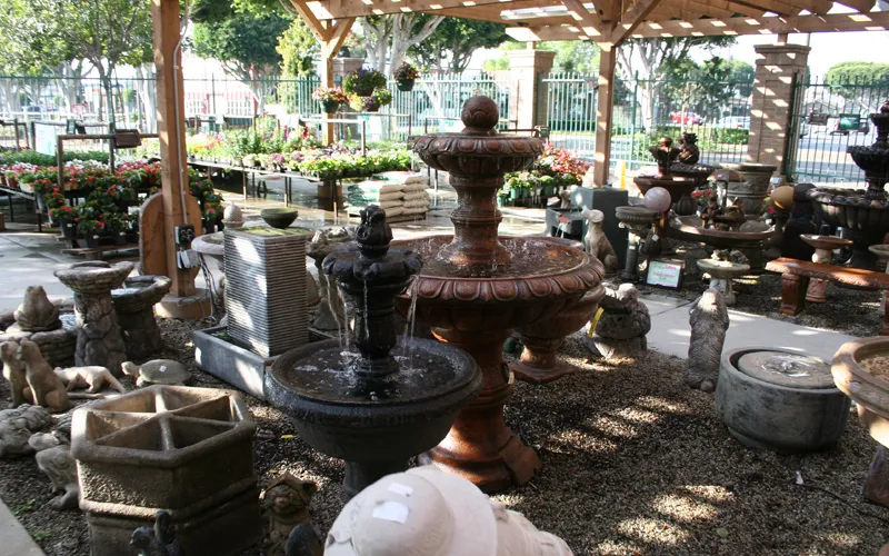 a room filled with furniture and vase on a table