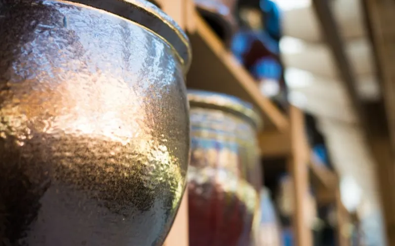 a close up of a metallic garden planter