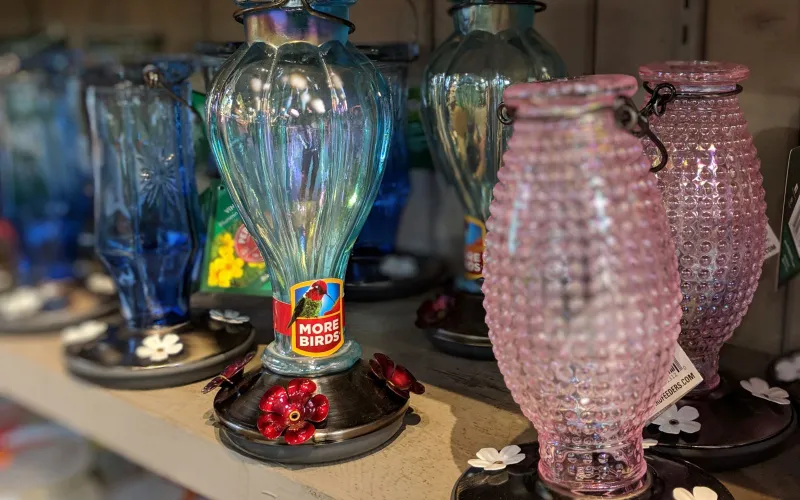 a group of glass bottles on a table