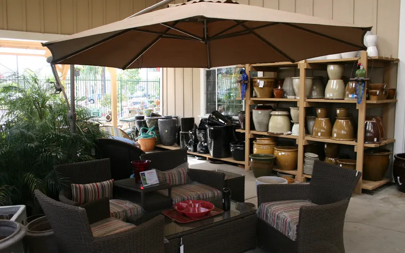 a living room filled with furniture and a large window