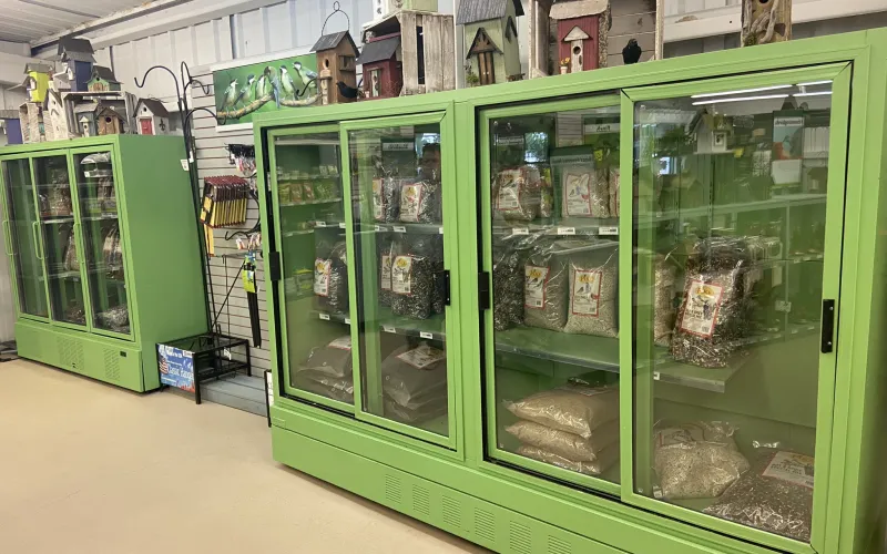 a group of green containers