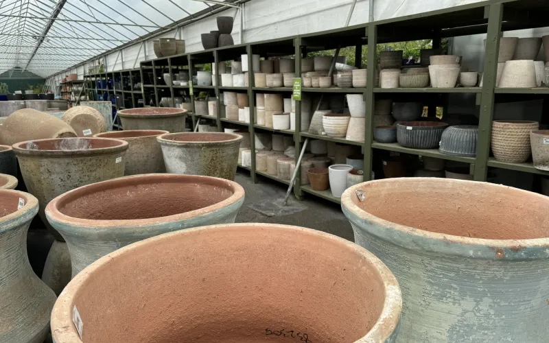 a large room with many pots