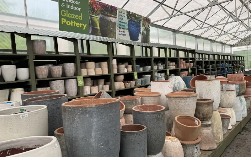 a large room with many pots