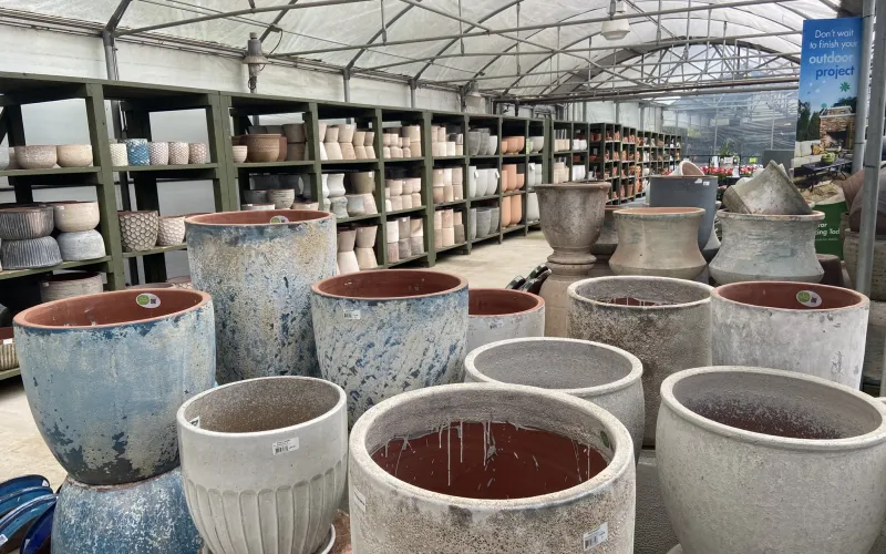 a large room with many pots