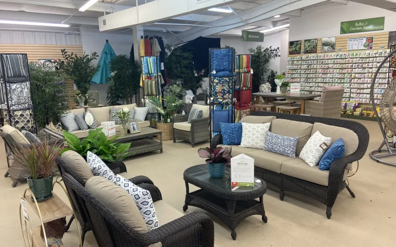 a large room with a couch and chairs