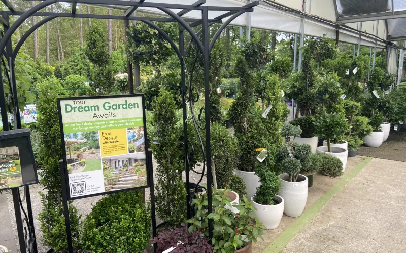 a sign in front of a building