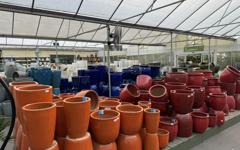 a large room with many orange containers