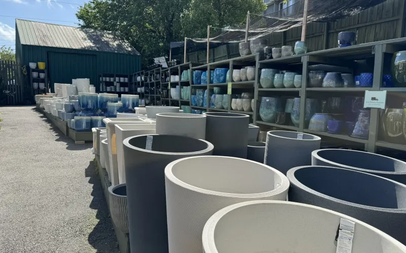 a group of metal buckets