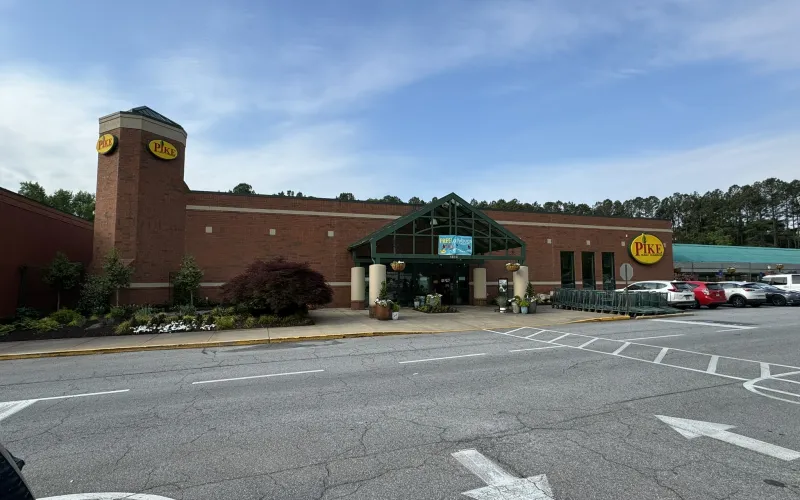 a building with a parking lot