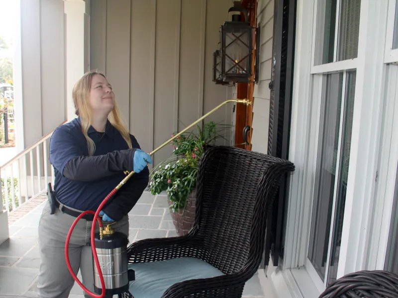 a person holding a hose