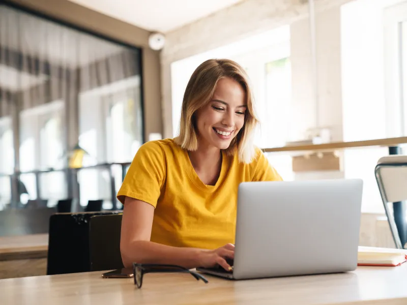 a woman working on her laptop