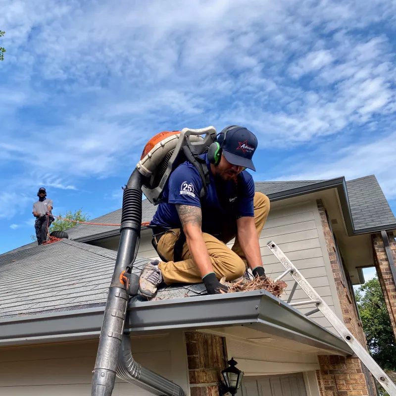 a man on a roof